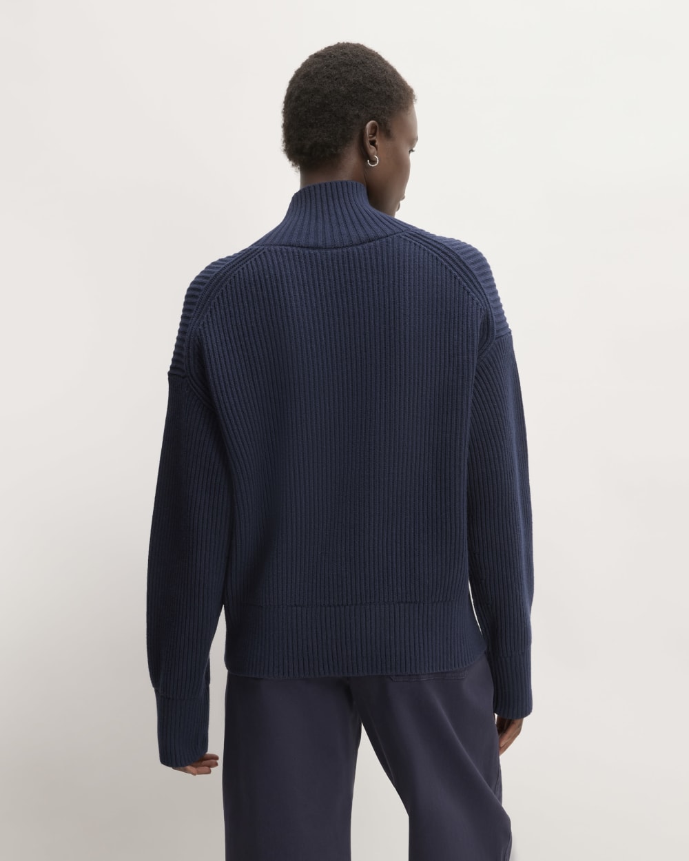 The Organic Cotton Ribbed Turtleneck in Navy — detail view