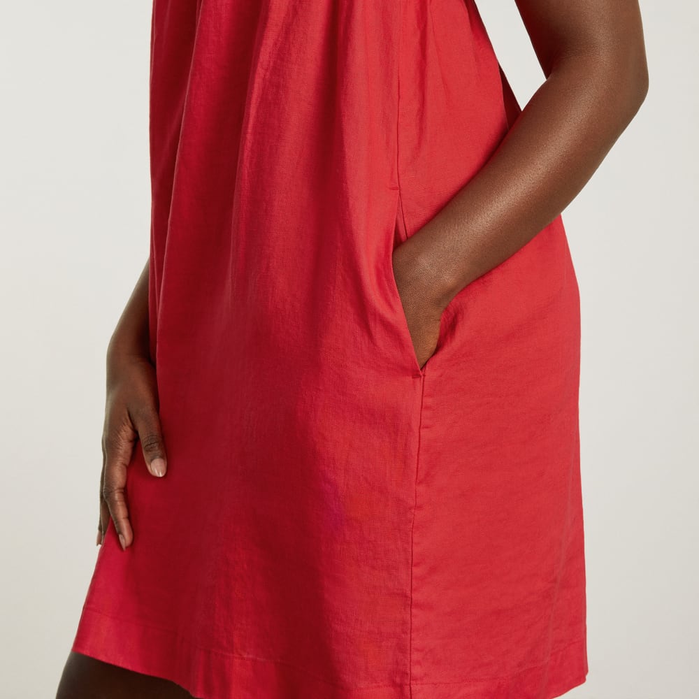 The Smocked Linen Dress in Goji Berry — detail view