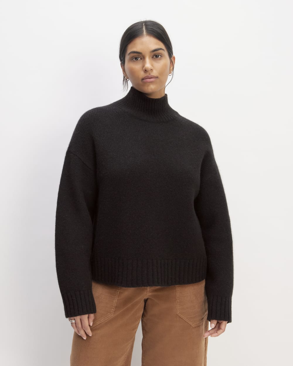 The Cloud Oversized Turtleneck in Black — front view