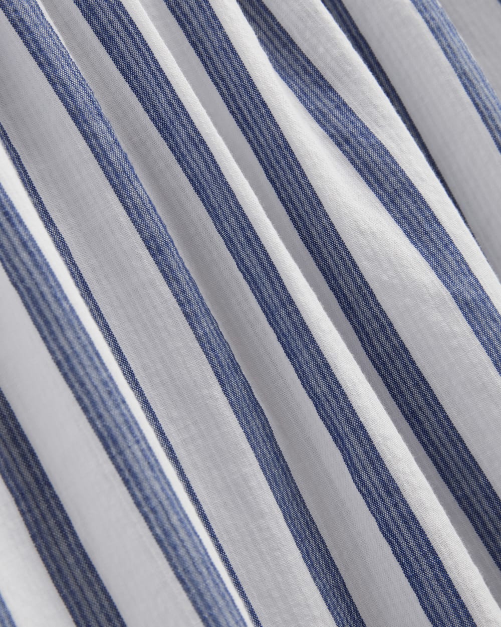 The Gauze Smock Dress in White / Mazarine Blue — detail view