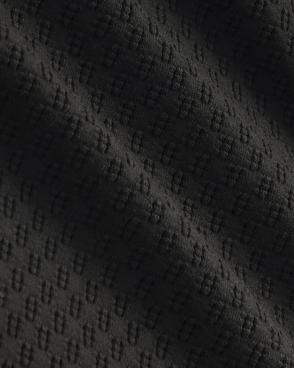 The Pointelle Cami in Black — detail view