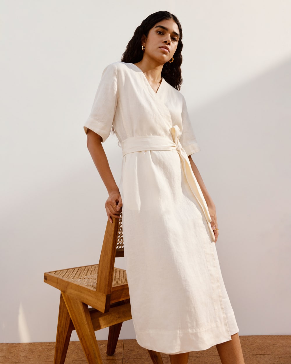 The Wrap Dress in Linen in Bone — detail view