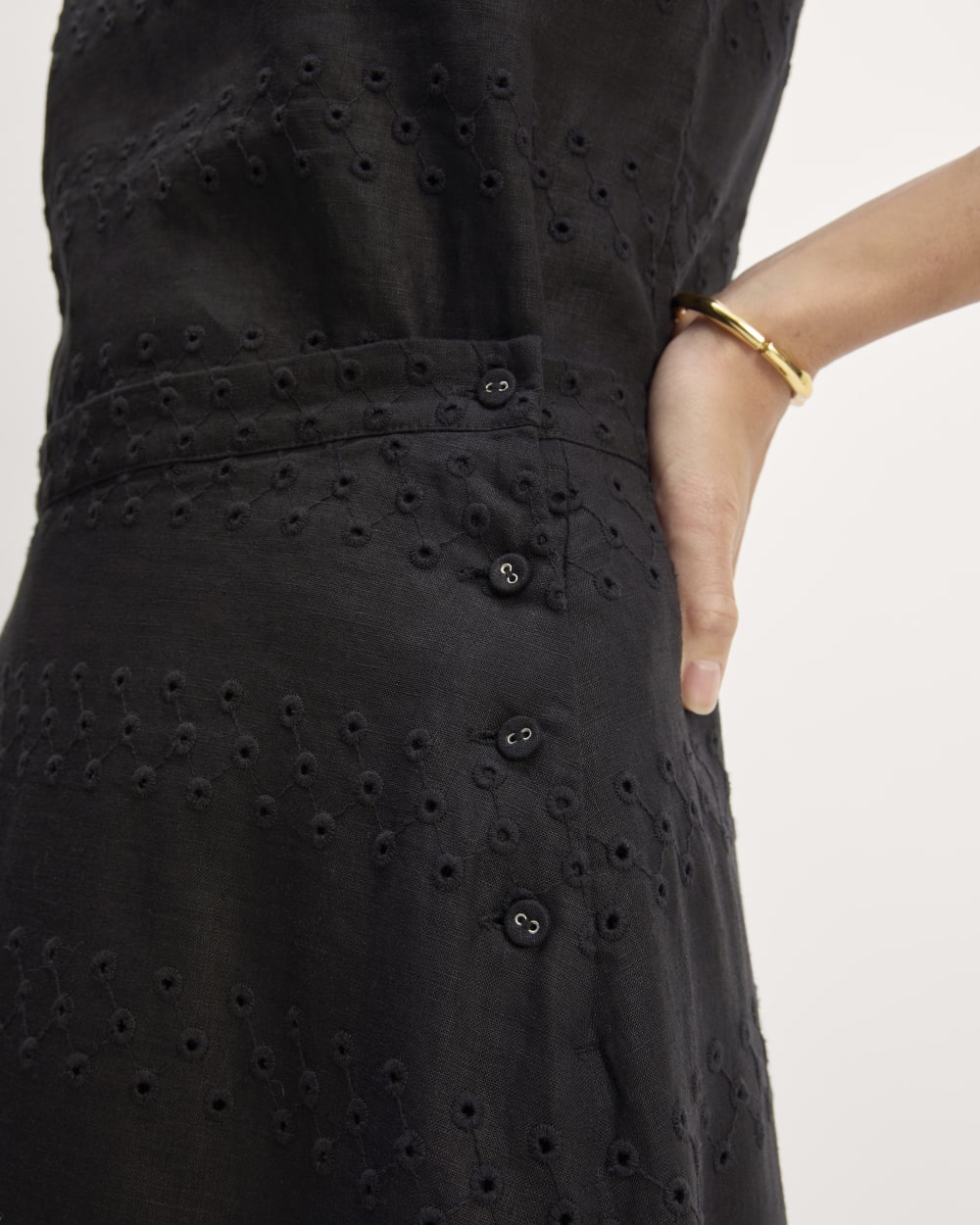 The Linen Eyelet Midi Skirt in Black Eyelet — detail view
