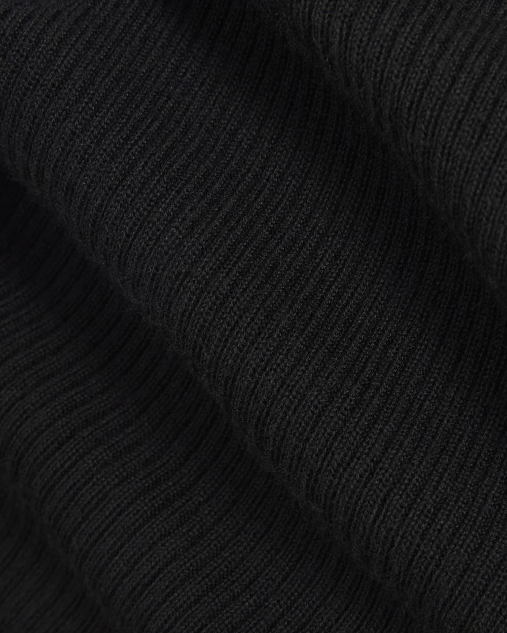 The Cardigan in Ultrasoft Merino in Black — detail view