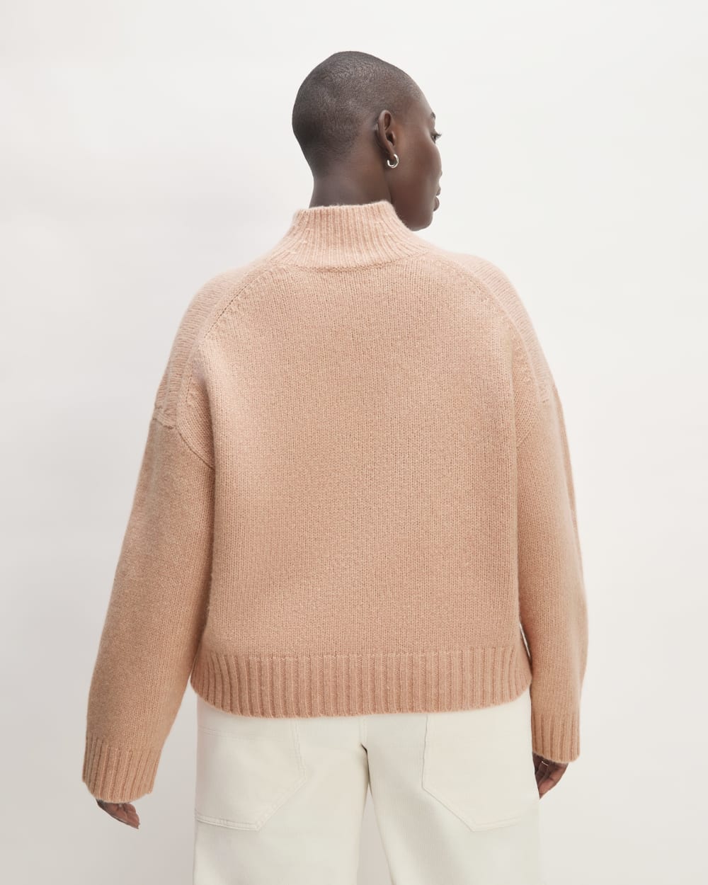 The Cloud Oversized Turtleneck in Blush Pink — detail view