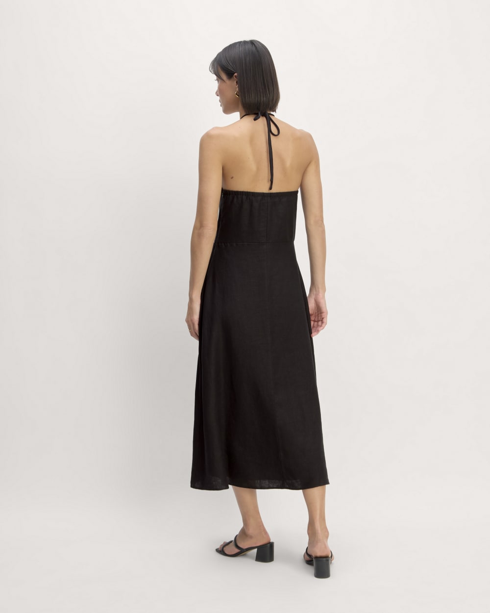 The Linen Halter-Neck Dress in Black — detail view