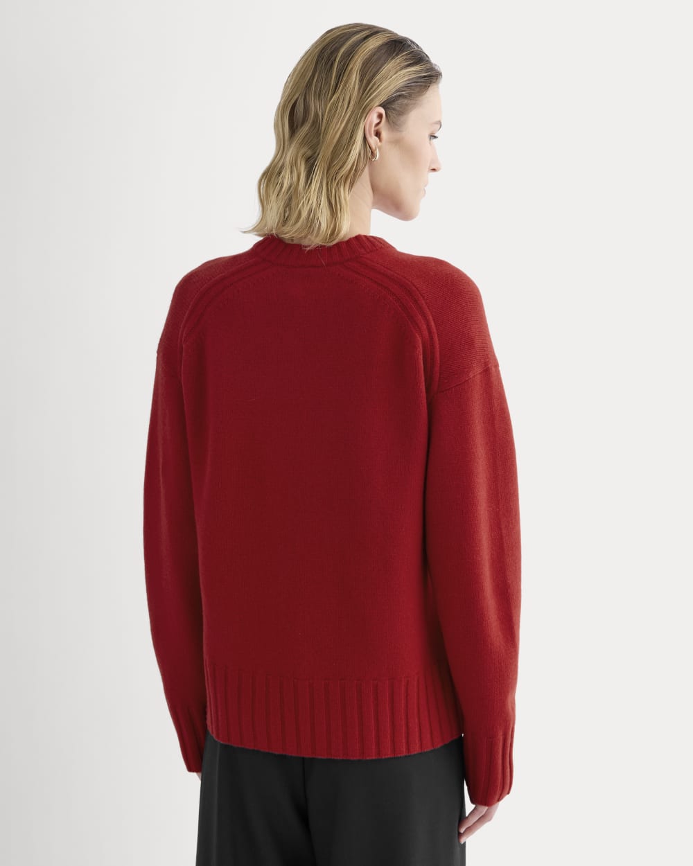 V-Neck Sweater in Extrafine Luxe Merino in Berry Red — detail view