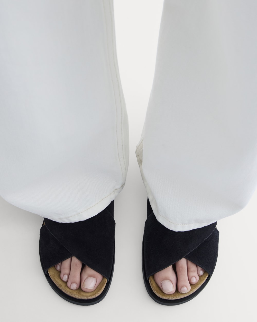 The Suede Crossover Sandal in Black — detail view
