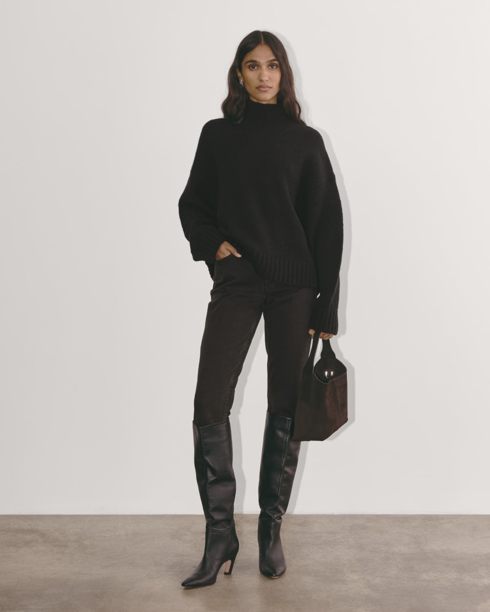 The Cloud Oversized Turtleneck in Black — detail view