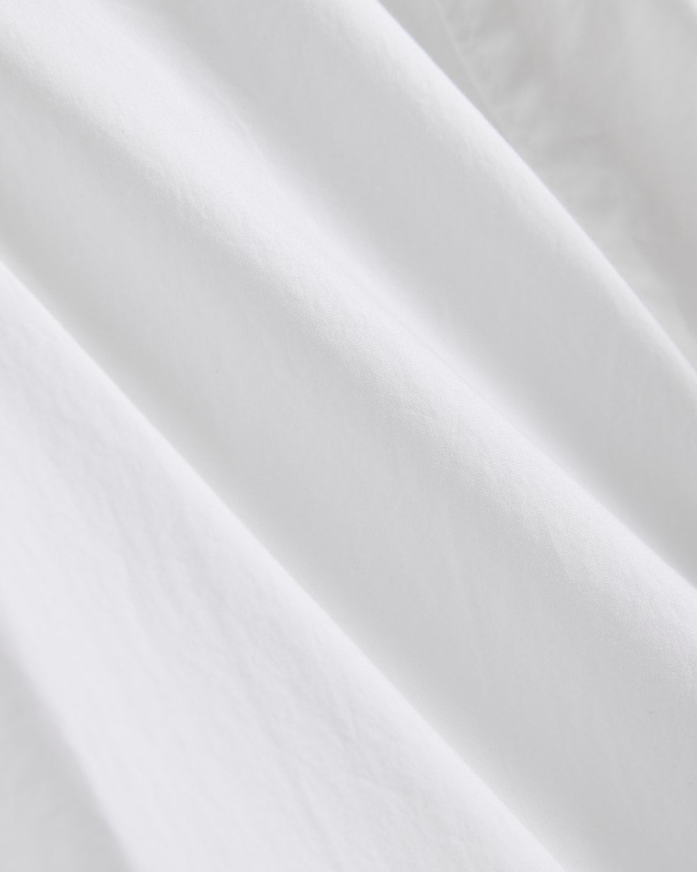 The Mini Shirtdress in Ultrasoft Cotton in White — detail view