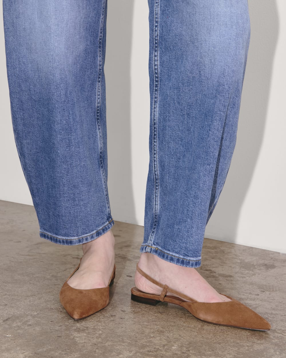 The Studio Slingback Flat in Saddle Brown Suede — detail view