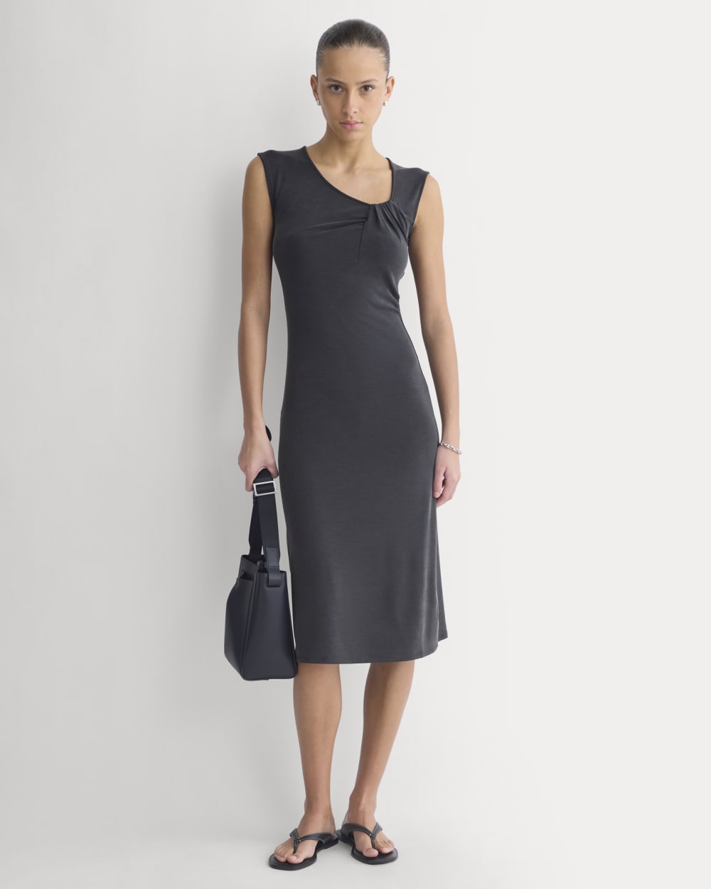 Knit Asymmetrical Midi Dress in Black — front view