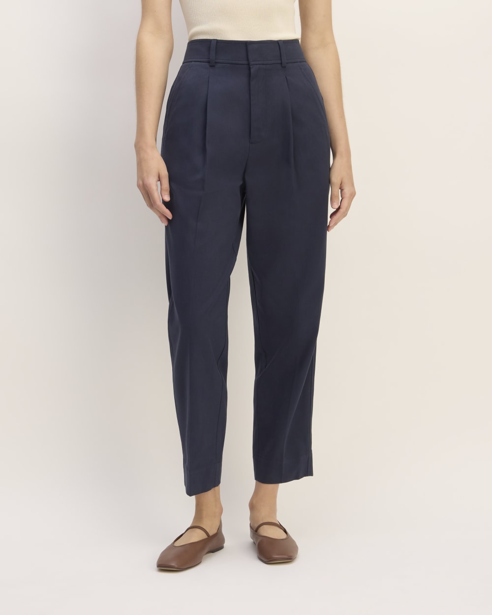 The Draper Tapered Pant in Buttersmooth in Navy — detail view