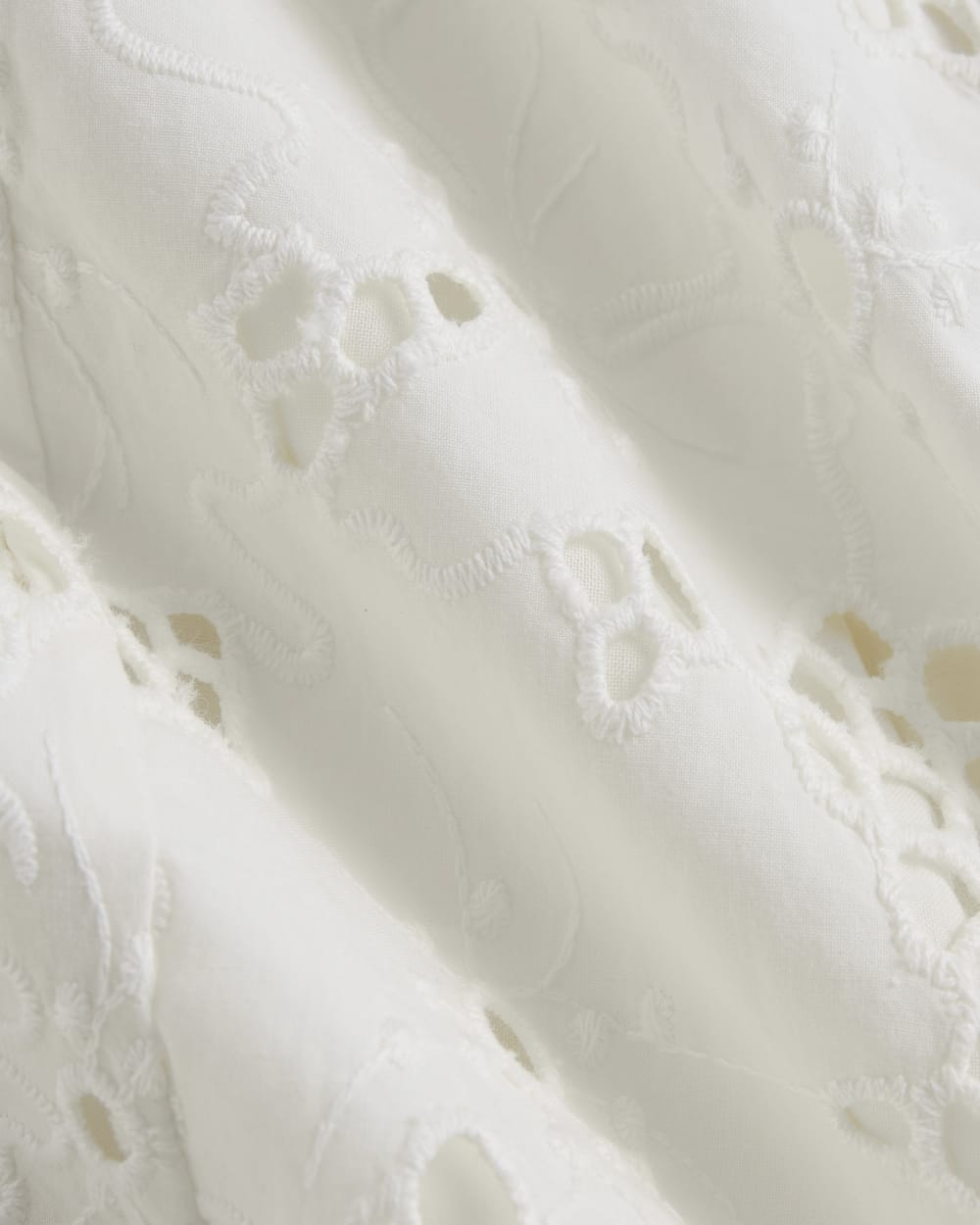 The Eyelet Midi Dress in Bone — detail view