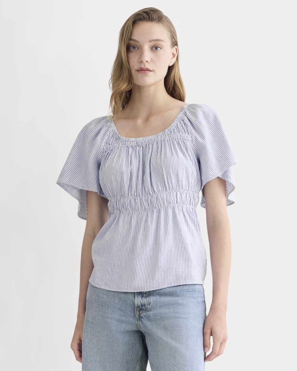 The Flutter-Sleeve Top in Stretch Linen in White / Dutch Blue — front view