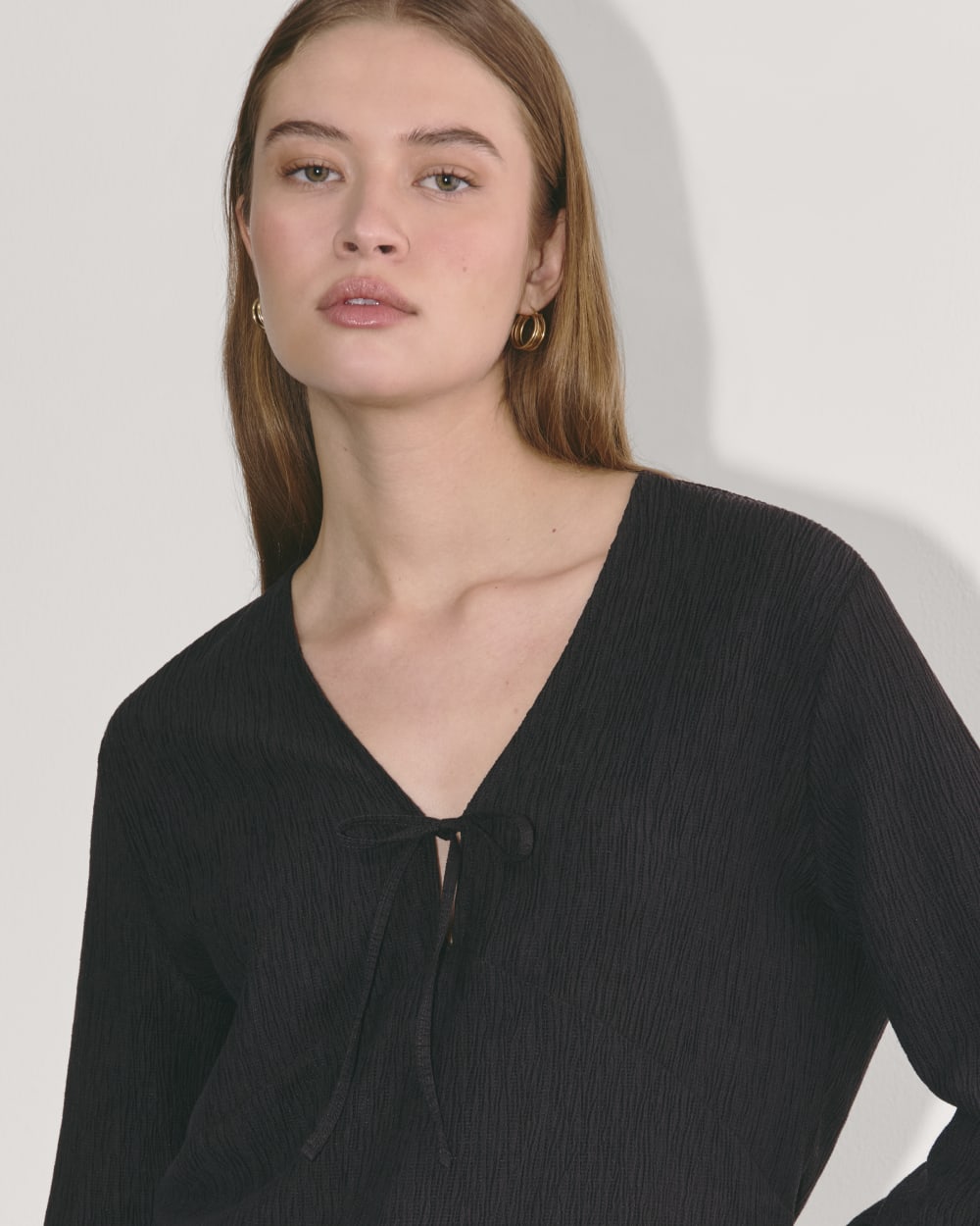 The Crinkle Long-Sleeve in Black — detail view