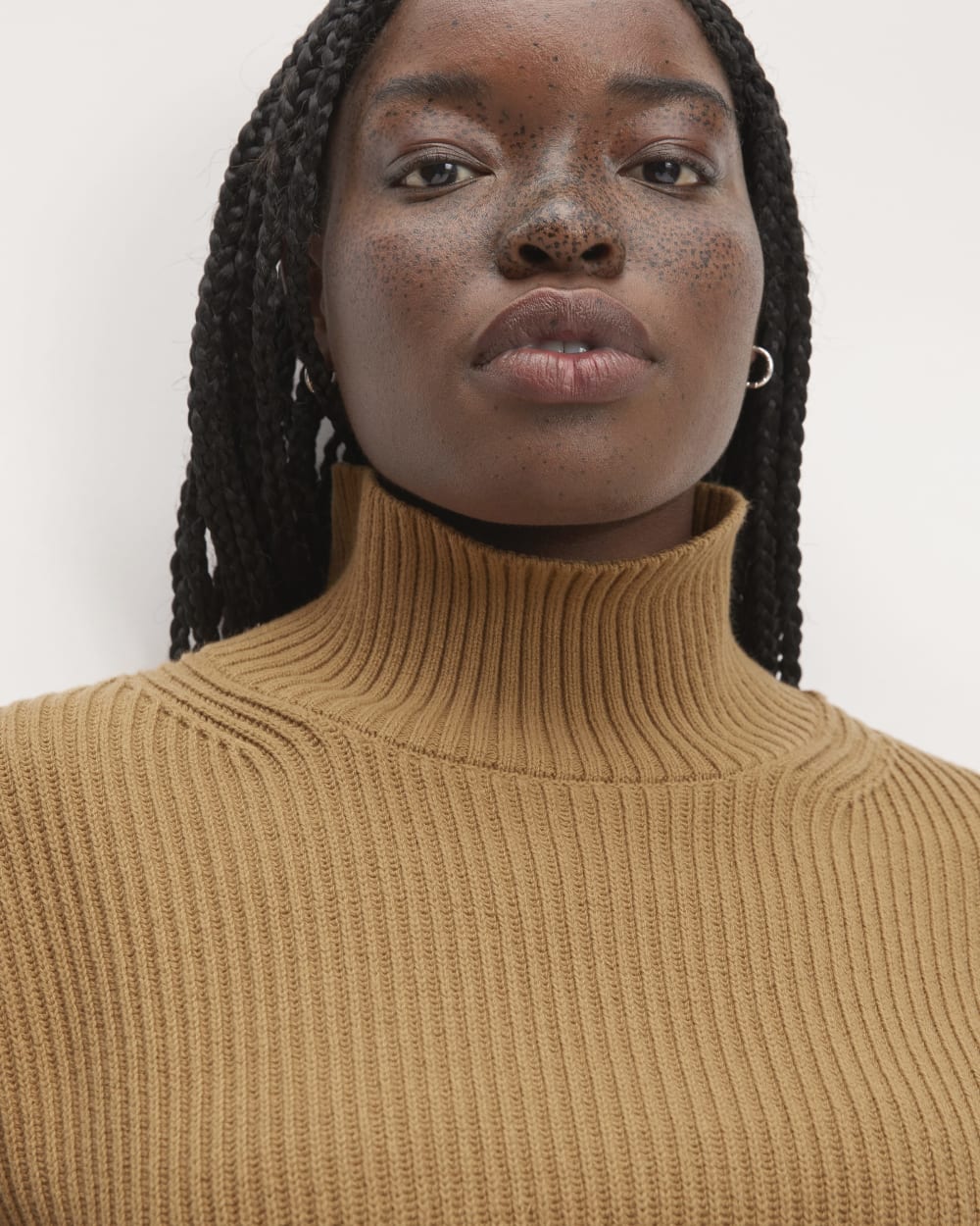 The Organic Cotton Ribbed Turtleneck in Toasted Coconut — detail view