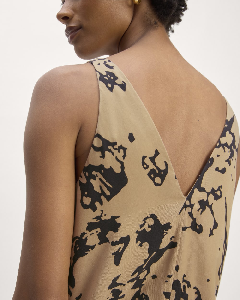 The TENCEL™ Midi Slip Dress in Black / Cornstalk Abstract — detail view