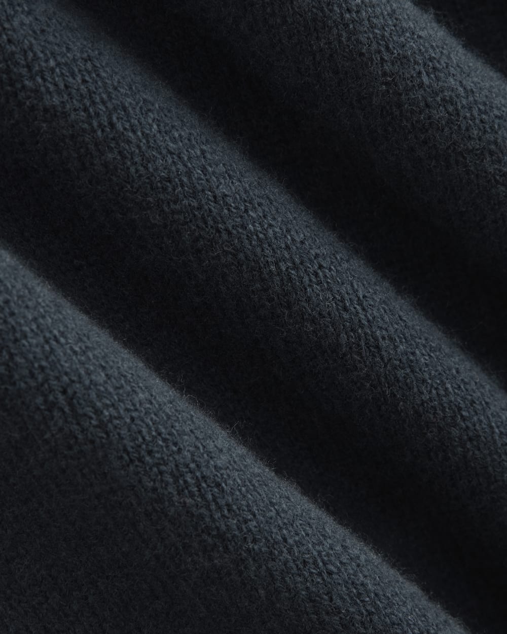 V-Neck Sweater in Extrafine Luxe Merino in Navy — detail view