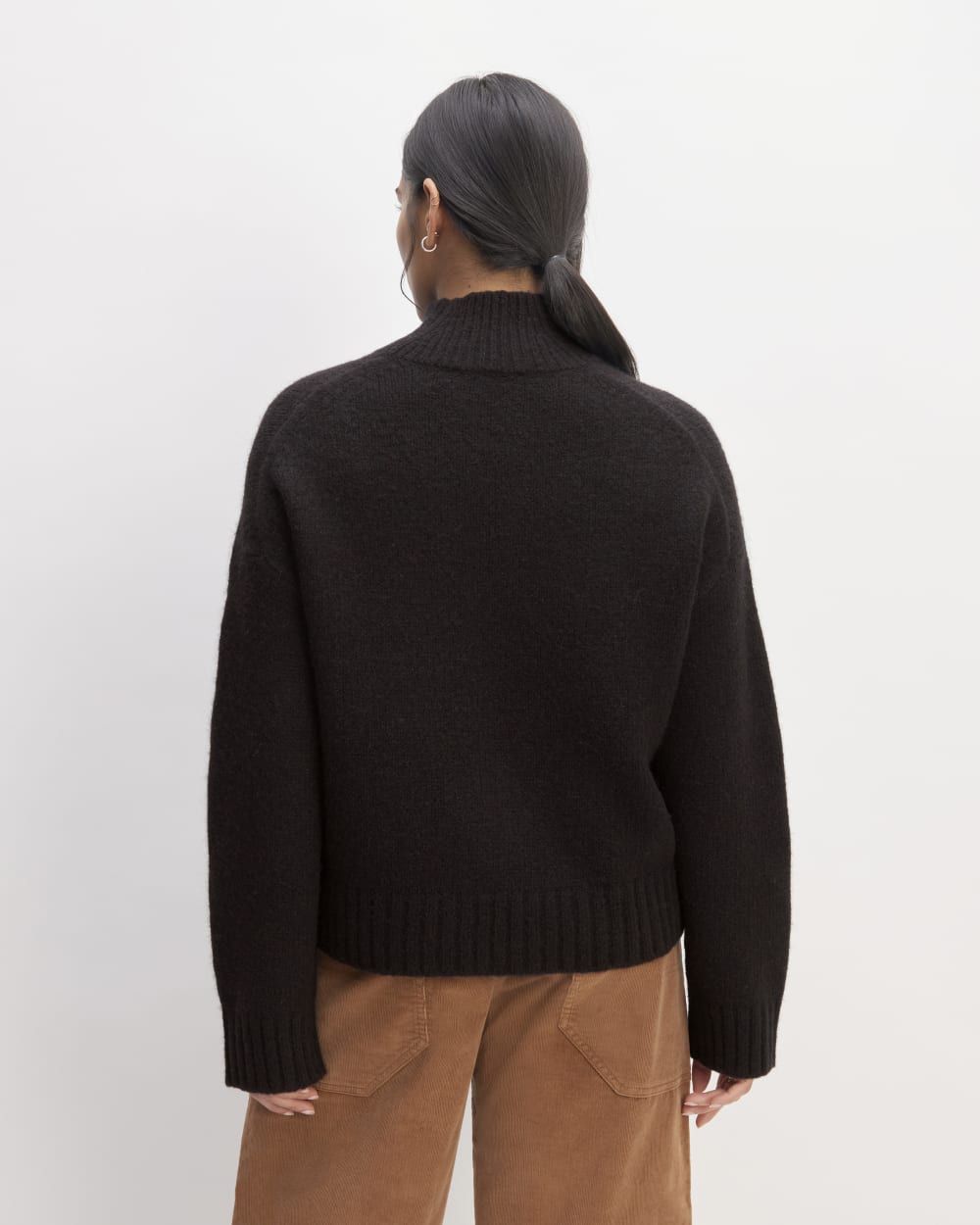 The Cloud Oversized Turtleneck in Black — detail view