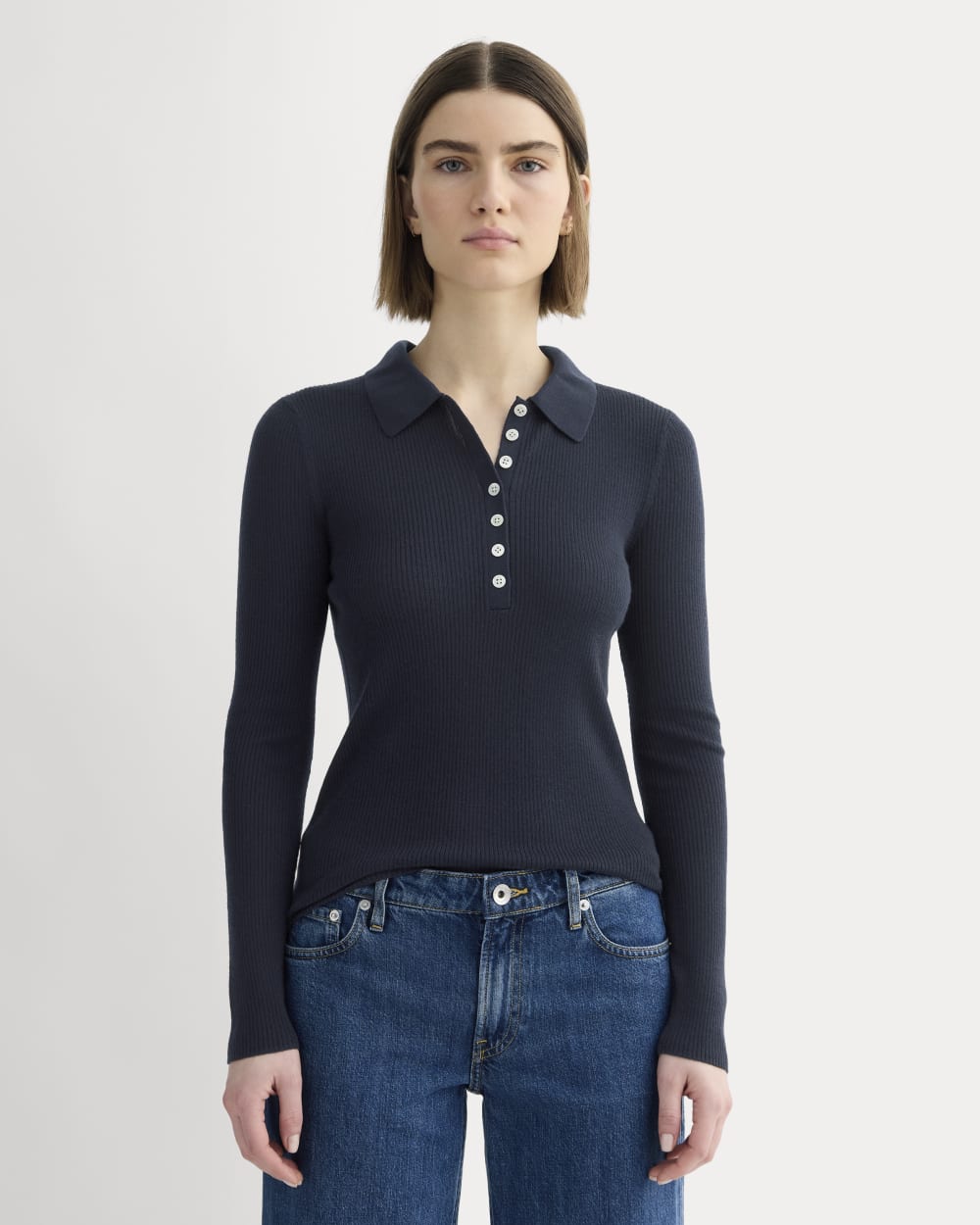The Polo in Ultrasoft Merino in Navy — front view
