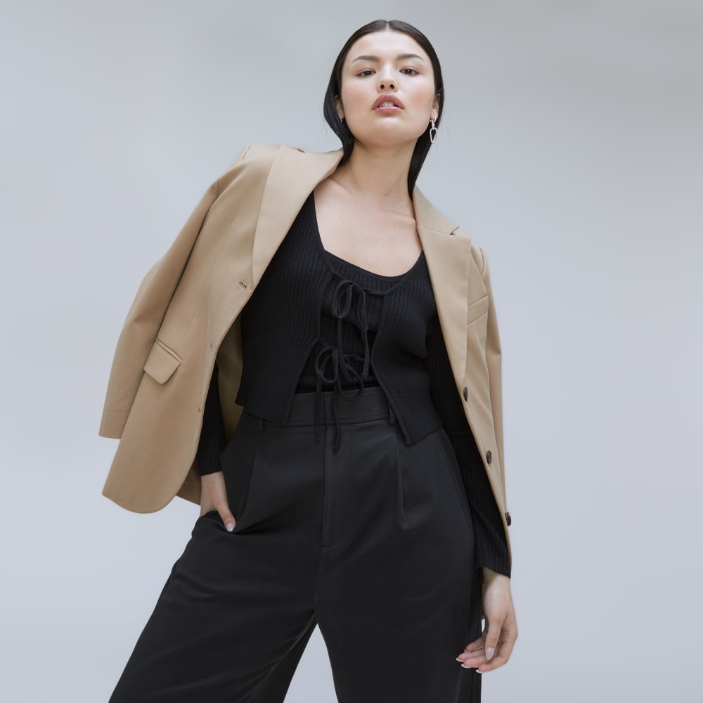 The Cotton-Merino Front-Tie Top in Black — detail view