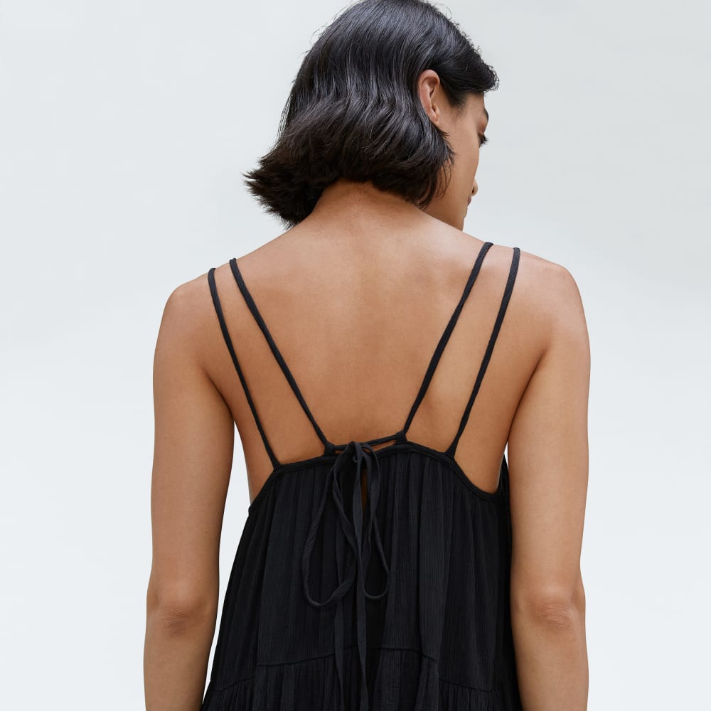 The Naia™ Ripple Tiered Maxi Dress in Black — detail view