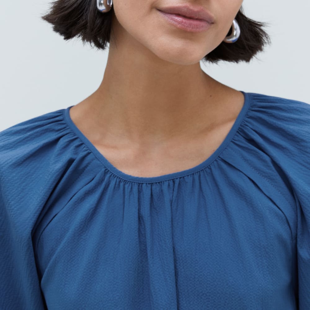 The Seersucker Puff Sleeve Dress in Deep Blue — detail view
