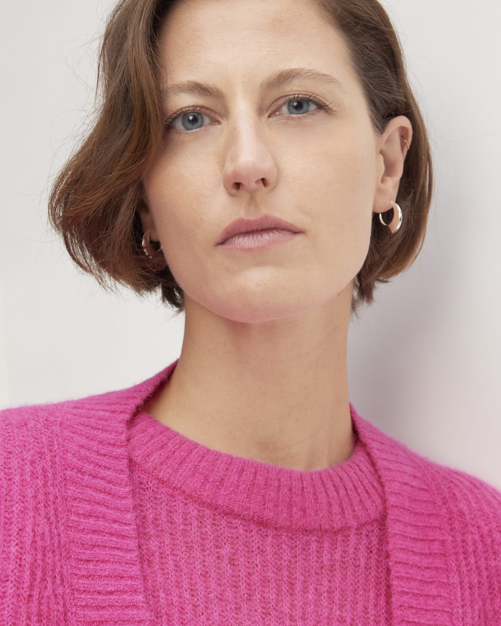 The Alpaca Oversized Cardigan in Fuchsia Pink — detail view