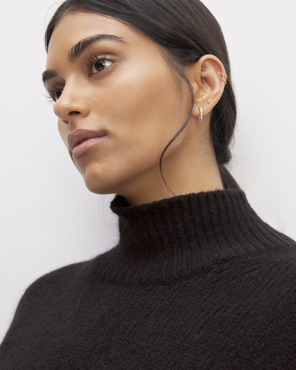 The Cloud Oversized Turtleneck in Black — detail view
