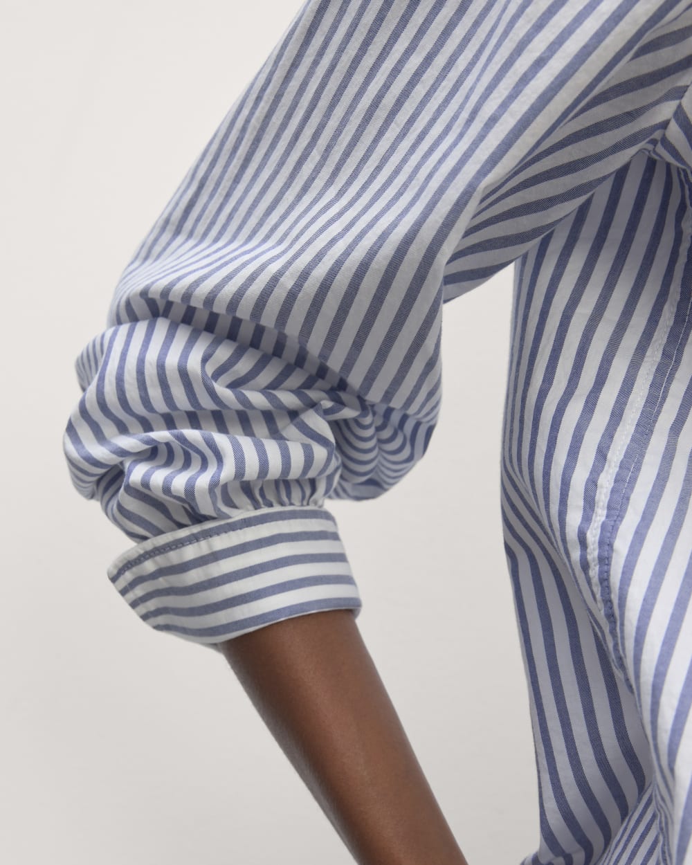 The Henley Shirt in Silky Cotton in White / Bellwether Blue — detail view