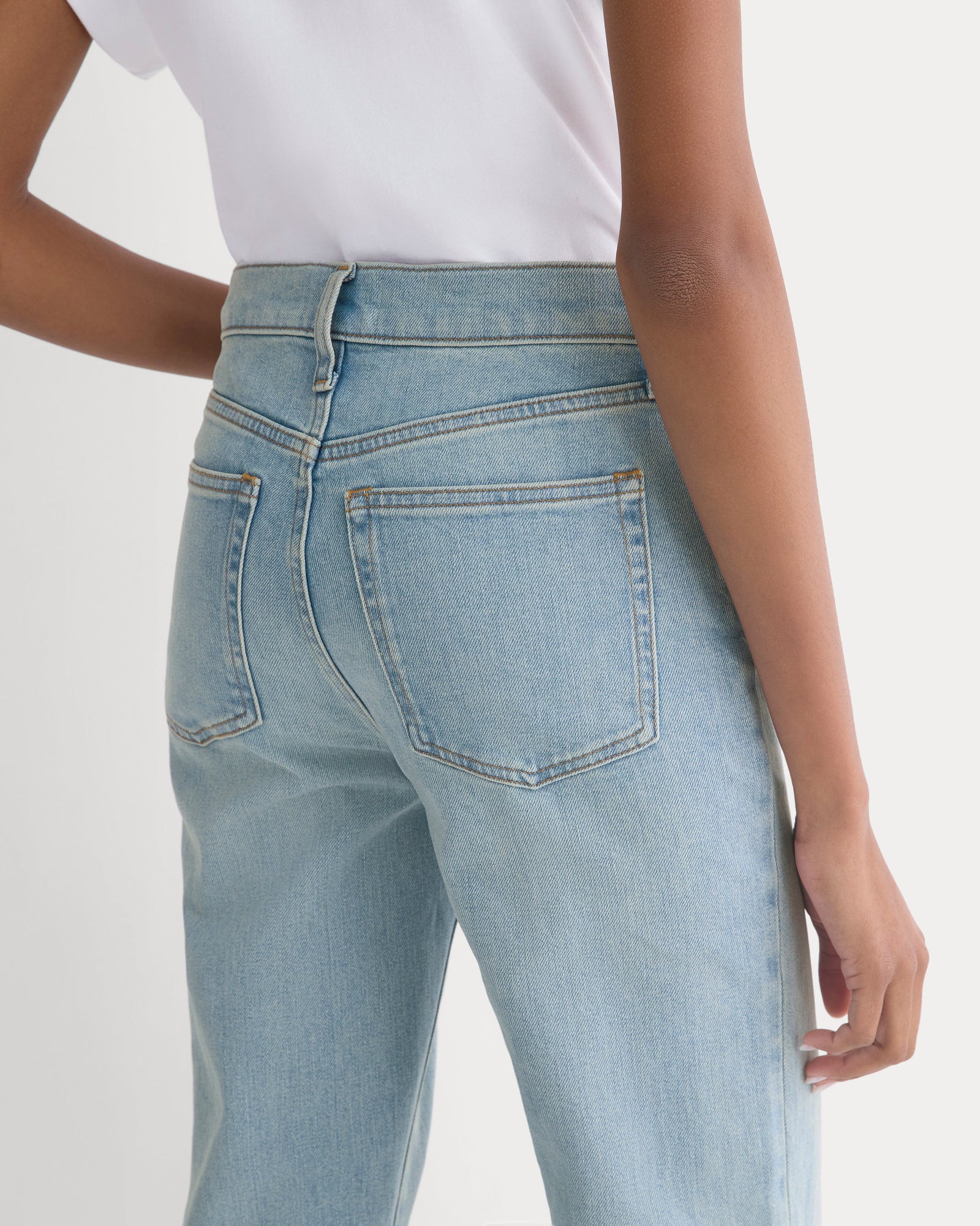 High-Rise Slim Bootcut Jean in Light Indigo — detail view