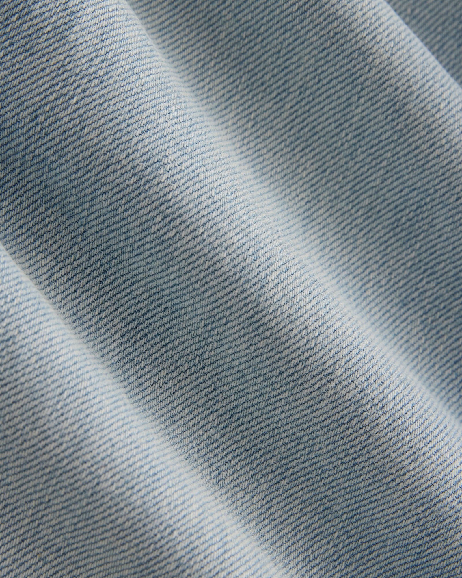 High-Rise Slim Bootcut Jean in Light Indigo — detail view