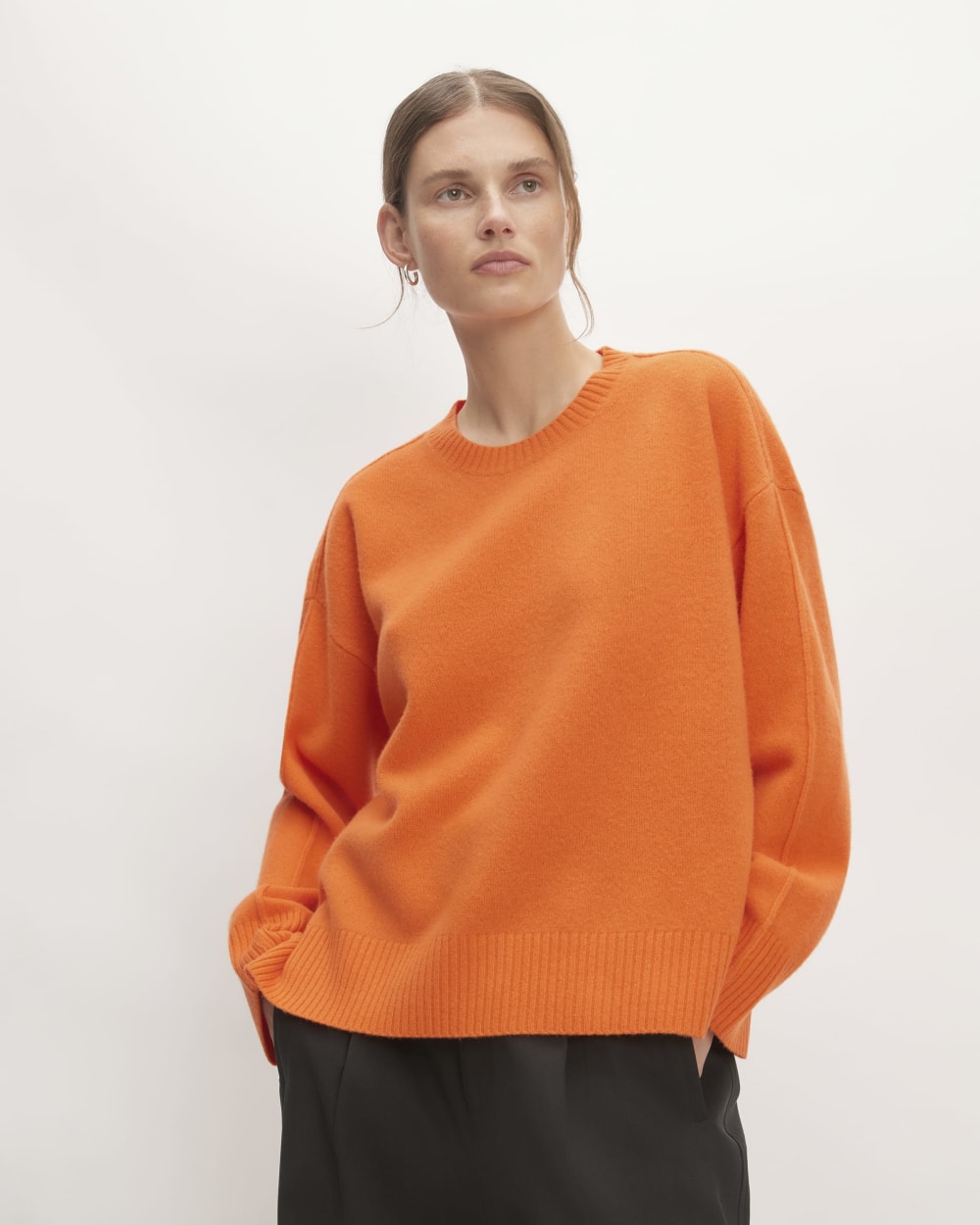 The Good Merino Wool Crewneck Sweater in Orange — front view