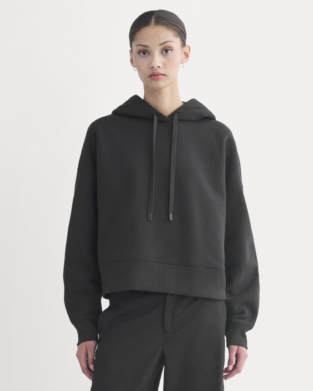 Cropped Luxe Fleece Hoodie in Black — front view