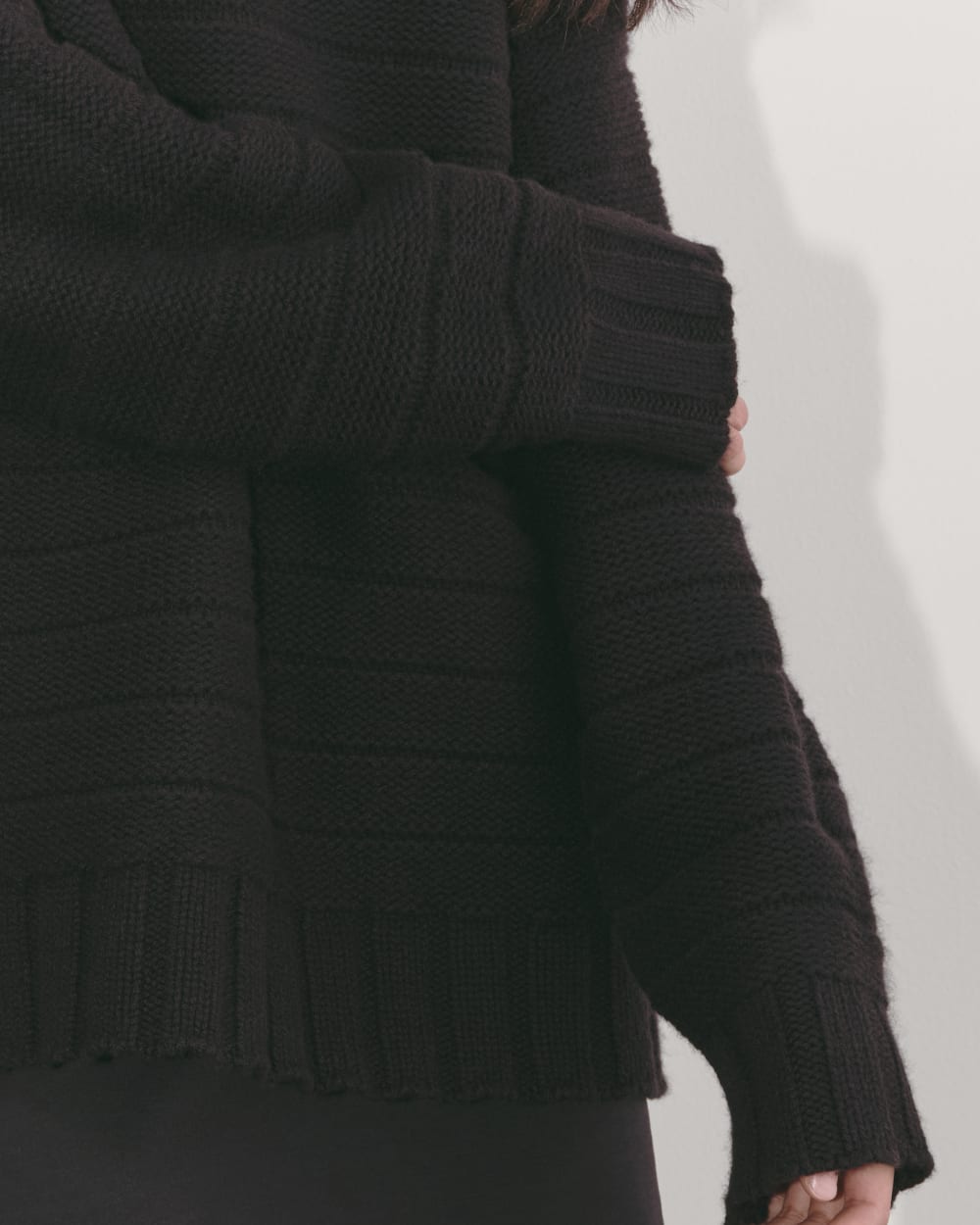 The Oversized Turtleneck in Luxe Merino in Black — detail view