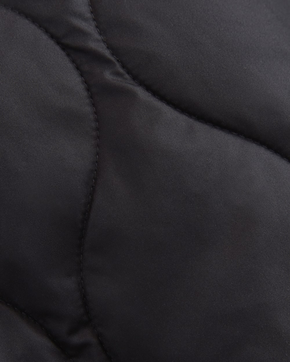 The Quilted Liner in Black — detail view