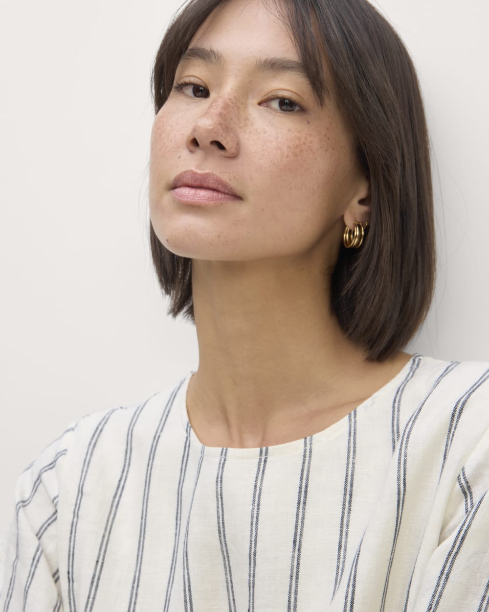 The Linen A-Line Midi Dress in Bone/Navy — detail view