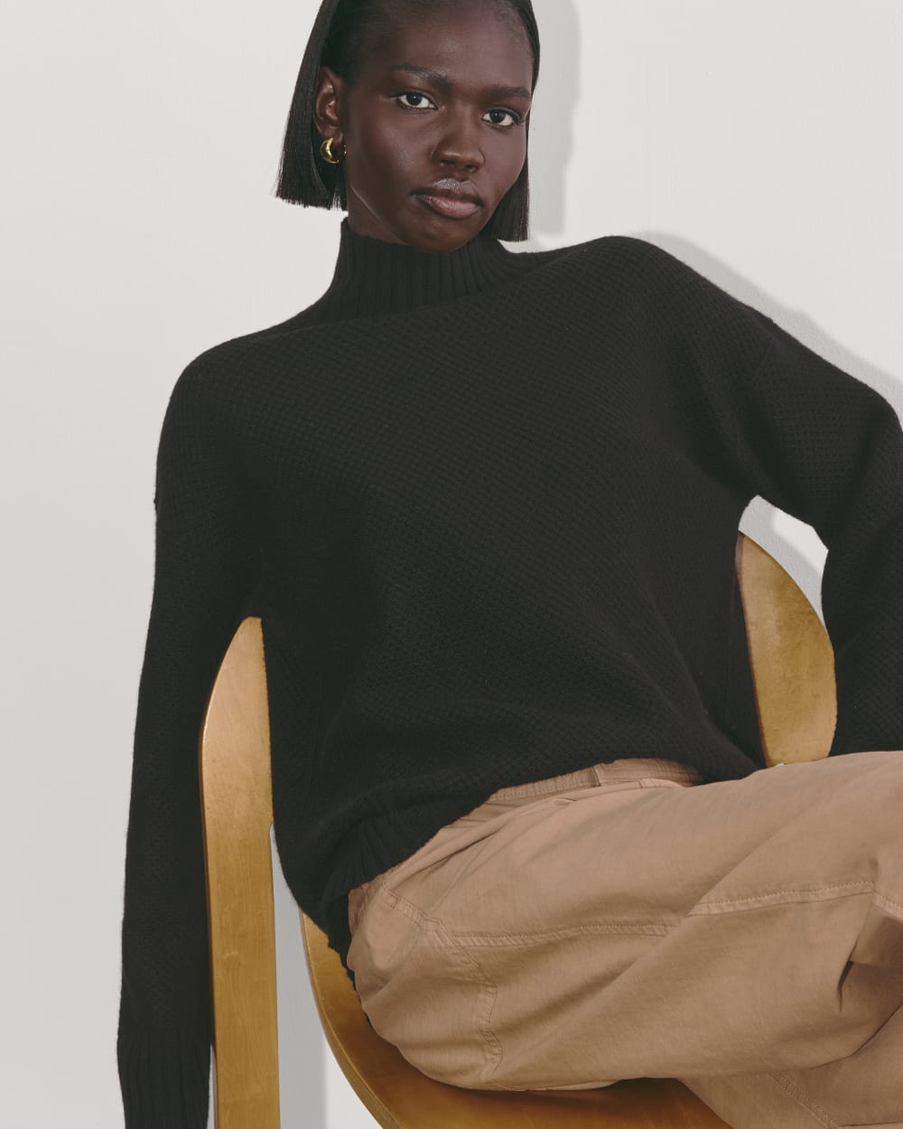The Honeycomb Funnel Neck in Wool Cashmere in Black — detail view