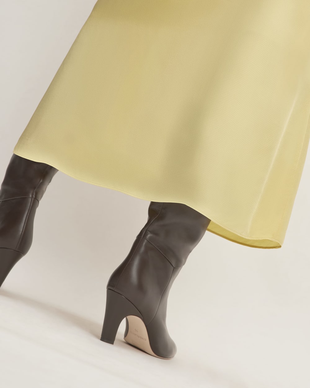The Hammered Satin Slip Skirt in Raffia — detail view