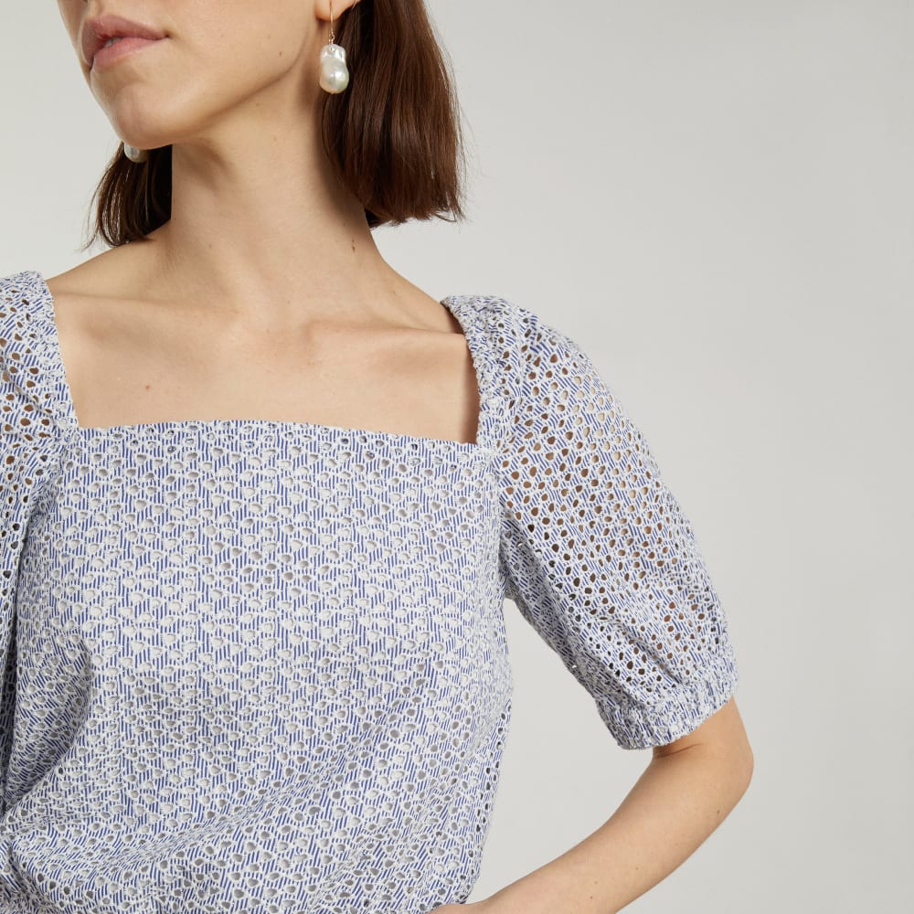 The Eyelet Puff Sleeve Top in Deep Blue / White — detail view