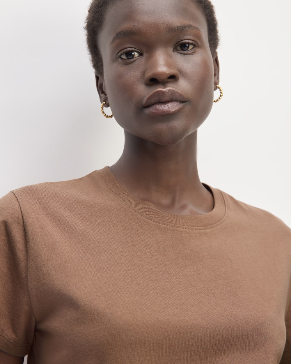 The Box-Cut Tee in Essential Cotton in Carob Brown — detail view