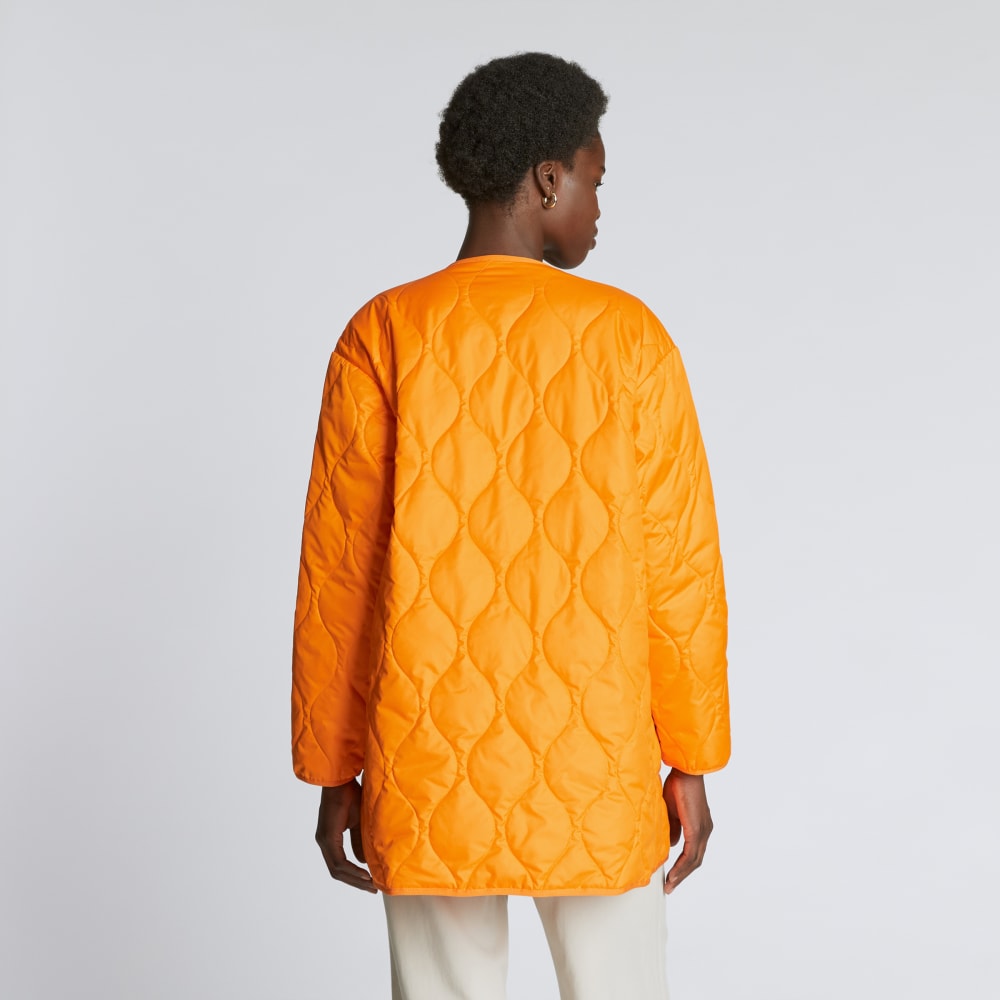 The Quilted Liner in Turmeric — detail view