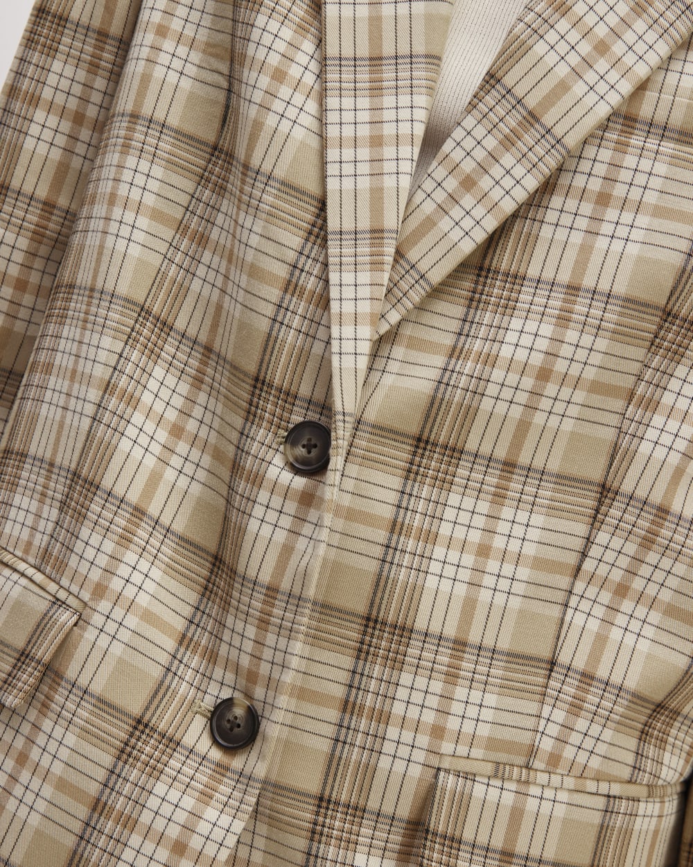 The Oversized Blazer in Buttersmooth in Pale Khaki Plaid — detail view