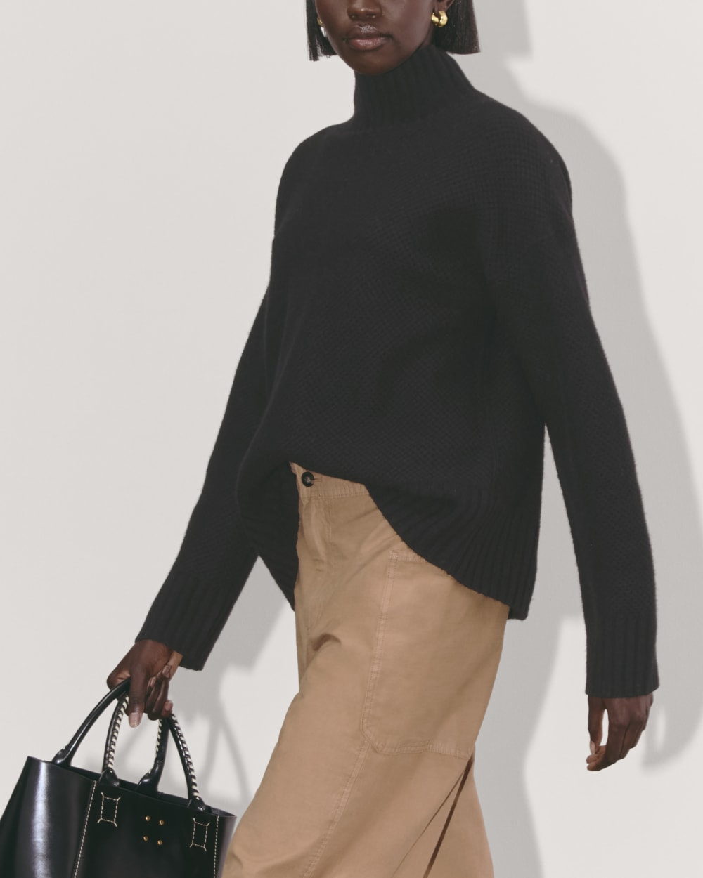 The Honeycomb Funnel Neck in Wool Cashmere in Black — detail view