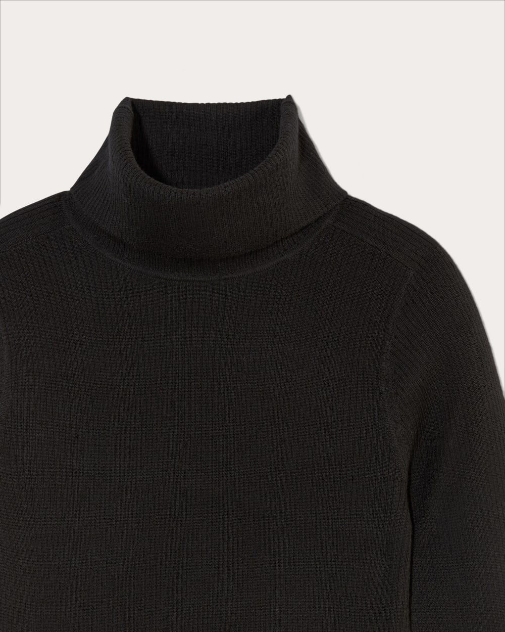 The Turtleneck in Ultrasoft Merino in Black — detail view