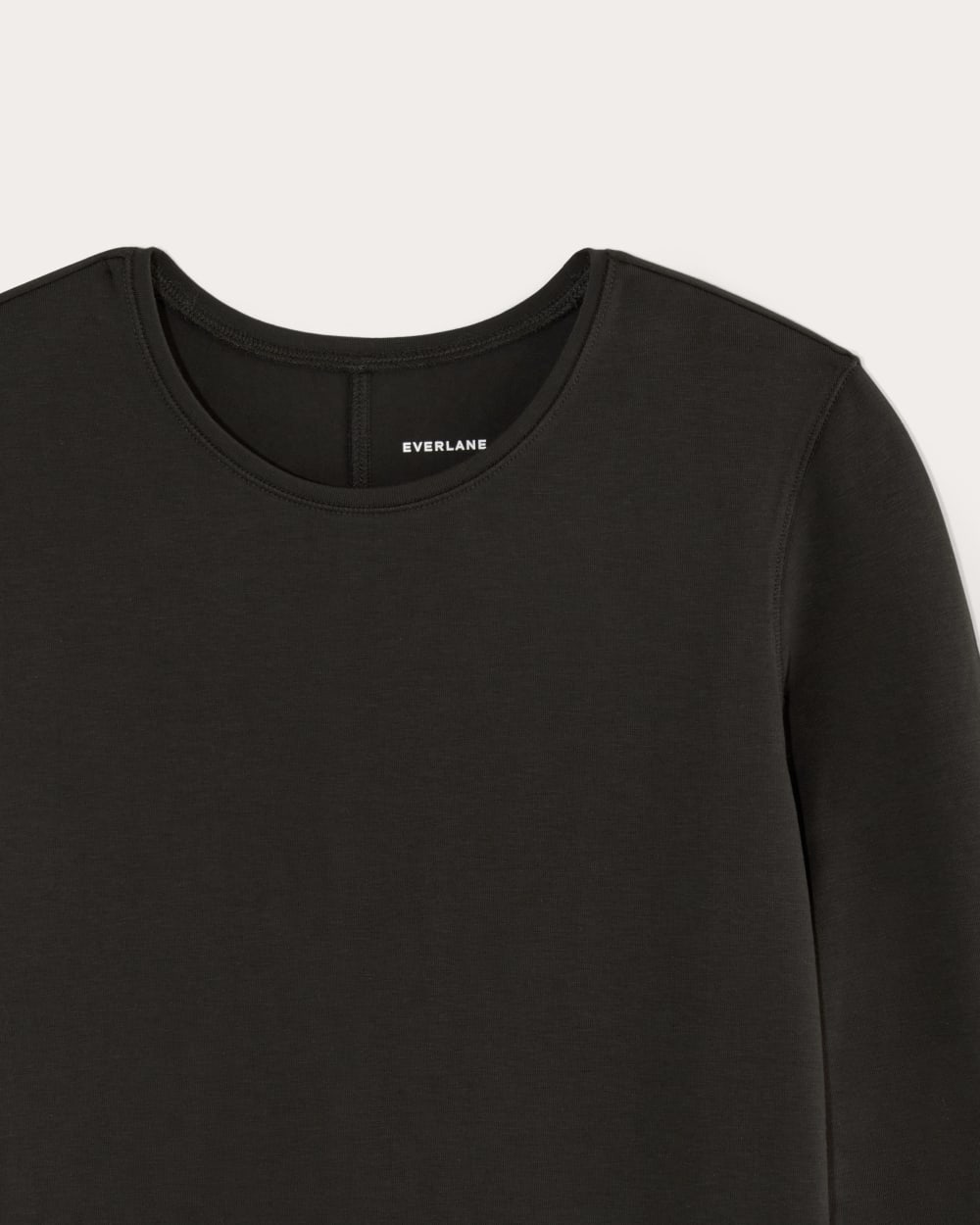 The Form Mini Dress in Black — detail view