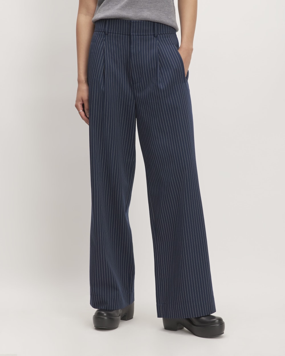 The Draper Pleated Pant in Buttersmooth in Navy / Bone — detail view
