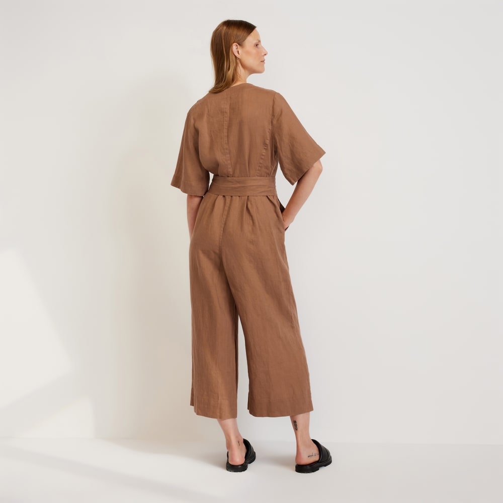 The Wrap Jumpsuit in Linen in Carob Brown — detail view