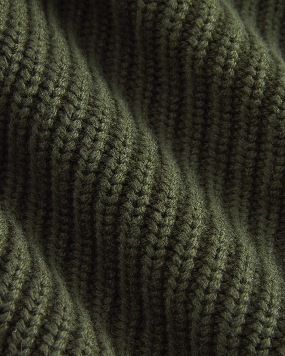 The Boxy Cardigan in Everyday Cotton in Dark Green — detail view